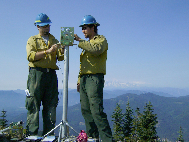 monitoring fires from atop mountain